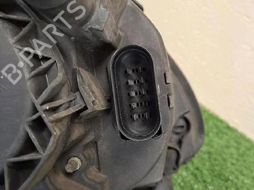 Used Left headlight VW TOURAN (1T1, 1T2) 1.9 TDI (105 hp) 30063925