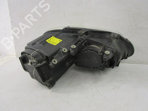 Used Left headlight VW TOURAN (1T1, 1T2) 1.9 TDI (105 hp) 15419929