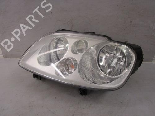 Used Left headlight VW TOURAN (1T1, 1T2) 1.9 TDI (105 hp) 15419929