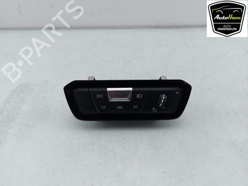 Used Headlight switch BMW 1 (F40) 118 d (136 hp) 13106492
