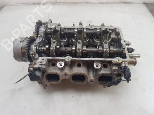 Used Cylinder head MITSUBISHI MIRAGE / SPACE STAR VI Hatchback (A0_A) 1.2 (71 hp) 28475617