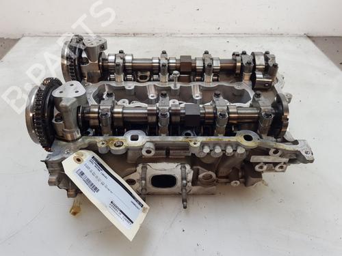 Used Cylinder head OPEL ASTRA K Sports Tourer (B16) 1.0 Turbo (35) (105 hp) 26883595