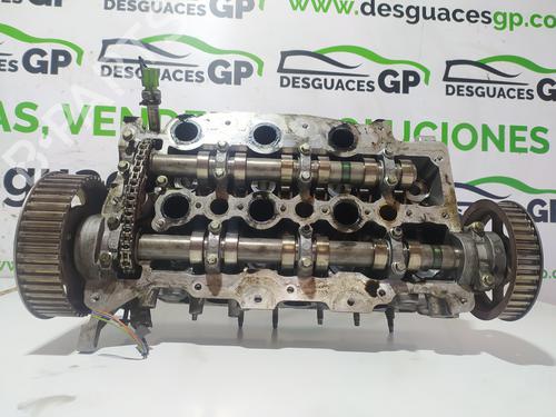 Used Cylinder head CITROËN C6 (TD_) 2.7 HDi (204 hp) 10978131