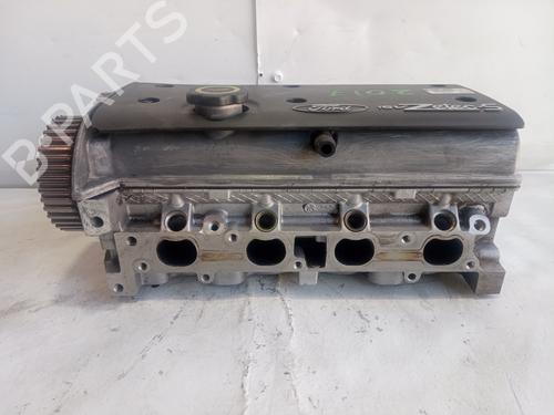 Used Cylinder head FORD PUMA (EC_) 1.4 16V (90 hp) 13499835