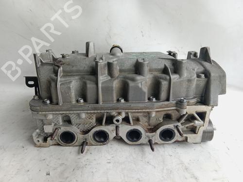 Used Cylinder head RENAULT CLIO III (BR0/1, CR0/1) 1.2 16V (BR0P, CR0P) (101 hp) 24701079
