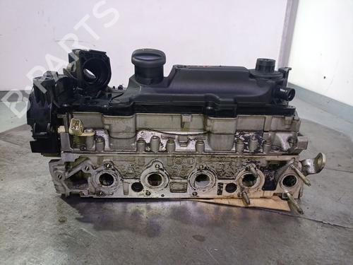 Used Cylinder head FORD FIESTA V (JH_, JD_) 1.4 TDCi (68 hp) 19329023