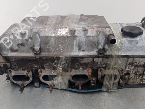 Used Cylinder head MITSUBISHI PAJERO III (V7_W, V6_W) 3.2 Di-D (V68W, V78W) (165 hp) 25760679