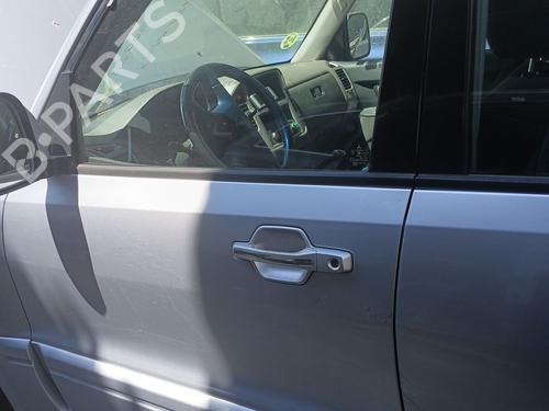 Used Left front door MITSUBISHI PAJERO III Canvas Top (V6_W, V7_W) 3.2 DI-D (V68W, V78W) (160 hp) 27930580
