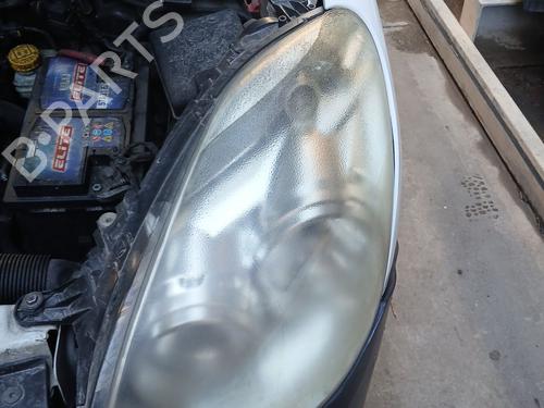 Used Left headlight OPEL COMBO Box Body/MPV (X12) 1.3 CDTI (B05) (90 hp) 31248490