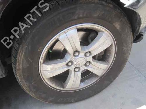 Left front steering knuckle KIA SPORTAGE II (JE_, KM_) 2.0 i 16V | BP2363044M25 