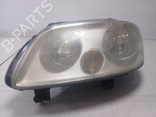 Used Left headlight VW TOURAN (1T1, 1T2) 1.9 TDI (105 hp) 23071819