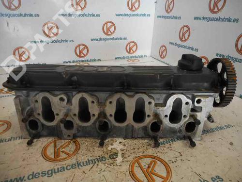Used Cylinder head Cylinder head AUDI 100 C4 Saloon (4A2) 2.3 E quattro (133 hp) 10978599 10978599
