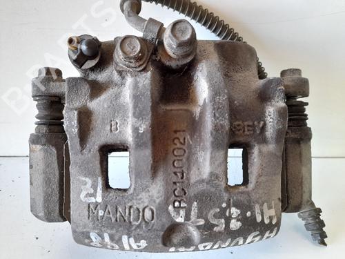 Used Left front brake caliper HYUNDAI H-1 / STAREX Bus (A1) 2.5 TD 4WD (99 hp) 12767516
