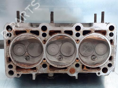 Used Cylinder head AUDI 100 C4 Saloon (4A2) 2.8 E (174 hp) 12767784