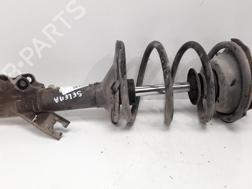 Used Left front shock absorber NISSAN VANETTE CARGO Bus (HC 23) 1.6 i (98 hp) 12759874