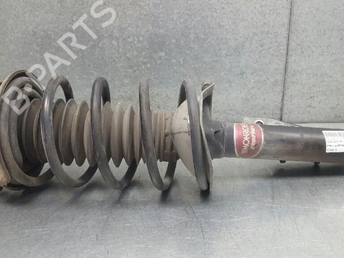 Left front shock absorber FORD ESCORT V (AAL, ABL) 1.8 TD (90 hp) 12718532