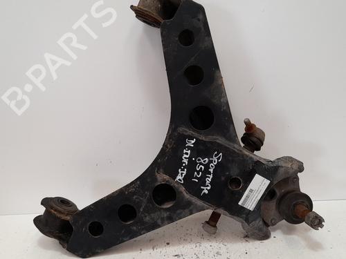 Left front suspension arm KIA SPORTAGE SUV (K00) 2.0 i 16V 4WD (128 hp) 0K01134300E | 0K01134300E |