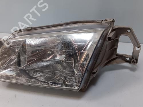 Used Left headlight MAZDA 323 F VI Hatchback (BJ) 2.0 TD (90 hp) 21376592