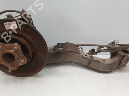 Used Left rear steering knuckle RENAULT KOLEOS I (HY_) 2.0 dCi (HY0K) (150 hp) 19073627