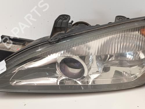 Used Left headlight NISSAN PRIMERA Hatchback (P11) 1.6 16V (99 hp) 12782378