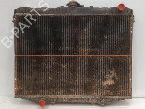 Used Water radiator FORD MAVERICK (UDS, UNS) 2.7 TD (100 hp) 26915549