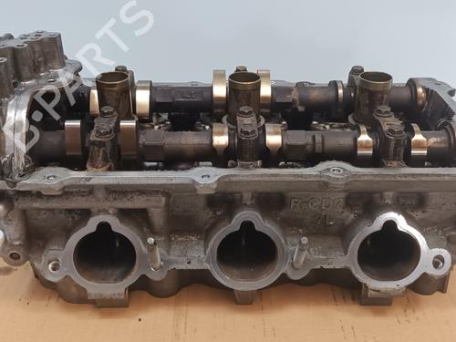 Used Cylinder head NISSAN MURANO I (Z50) 3.5 4x4 (234 hp) 18643514