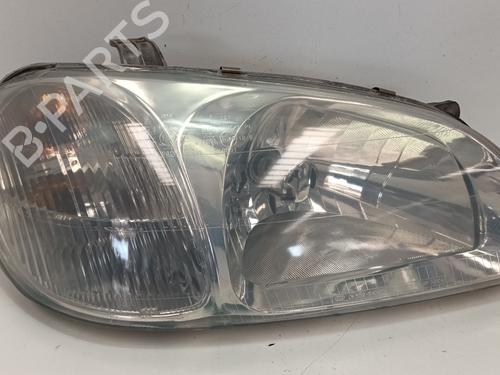 Used Right headlight KIA CARNIVAL I (UP) 2.9 TDi (126 hp) 12844337