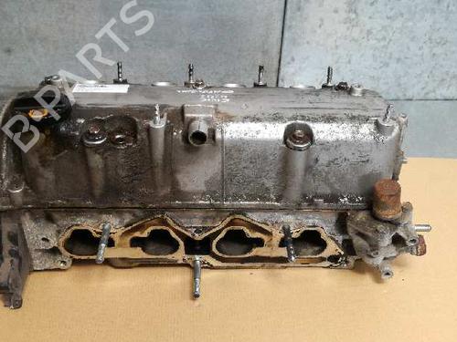 Used Cylinder head HONDA CIVIC VII Hatchback (EU, EP, EV) 1.6 i (EP2, EU8, EU6) (110 hp) 12704504