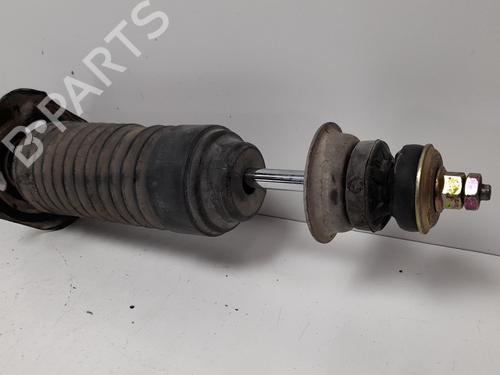 Left rear shock absorber MAZDA DEMIO (DW) 1.3 i 16V (DW3W) | BP12779256M18 