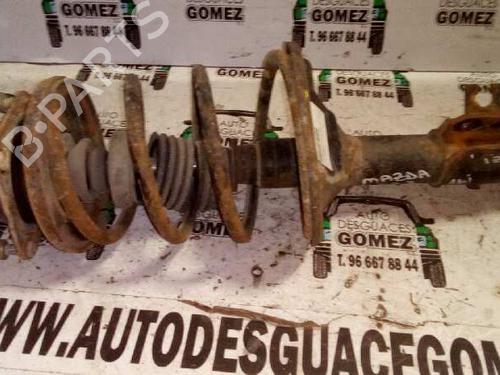 Used Left front shock absorber MAZDA 323 F IV (BG) 1.6 16V (BG6S, BG6P) (88 hp) 12793711