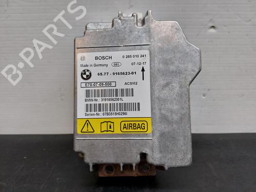 ECU airbags BMW X5 (E70) xDrive 35 d 65779165623 / 0285010241