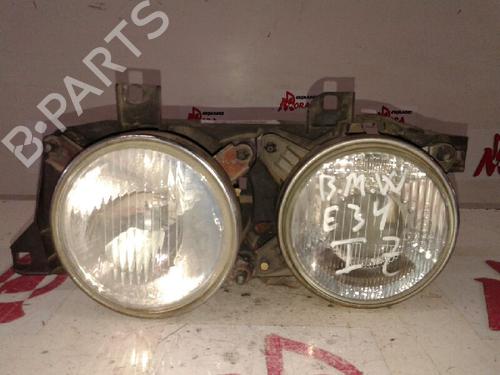 Used Left headlight BMW 5 (E34) 520 i 24V (150 hp) 12833683