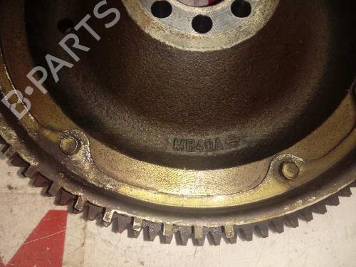 Używane Koło zamachowe NISSAN CABSTAR (F24M, F24W) 28.11 DCI, 32.11 DCI, 35.11 DCI 2.5 (F24M) (110 hp) 14129865