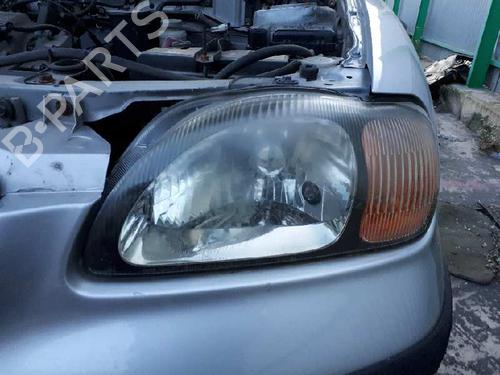 Used Left headlight SUZUKI BALENO (EG) 1.6 i 16V (SY416) (98 hp) 12837355