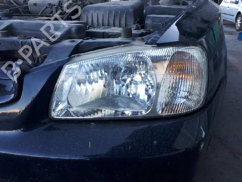Used Left headlight HYUNDAI ACCENT II (LC) 1.3 (86 hp) 12835913