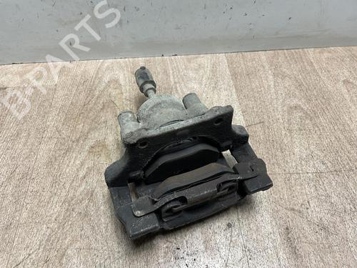 Used Left rear brake caliper BMW 1 (E81) 118 d (143 hp) 13116022