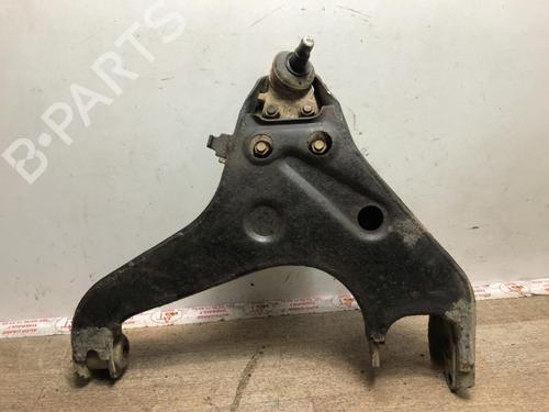 Used Left front suspension arm MITSUBISHI L200 (K7_T, K6_T, K5_T) 2.5 TD 4WD (K74T) (115 hp) 23100123