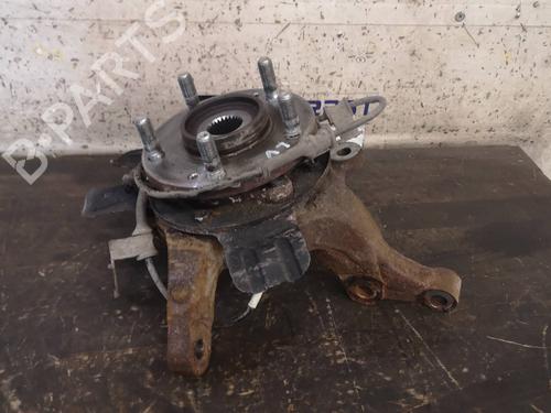 Used Left front steering knuckle KIA CARENS IV 1.7 CRDi (116 hp) 12876586