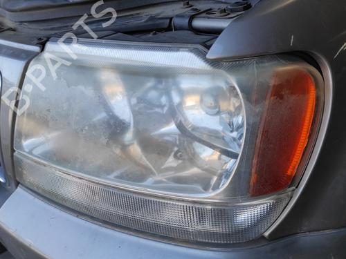 Left headlight JEEP GRAND CHEROKEE II (WJ, WG) 2.7 CRD 4x4 | BP23235848C28