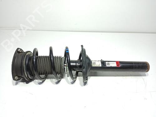 Used Left front shock absorber SKODA OCTAVIA III Combi (5E5, 5E6) 1.6 TDI (105 hp) 21815675