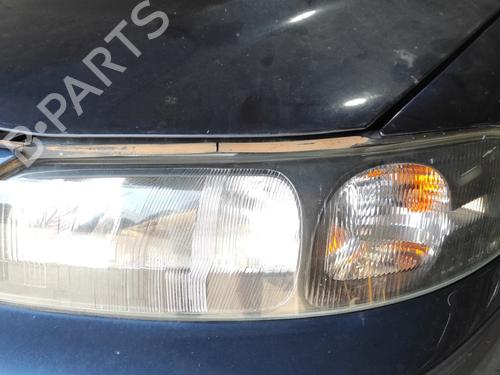 Left headlight VOLVO V70 II (285) 2.4 T (200 hp) 8693567