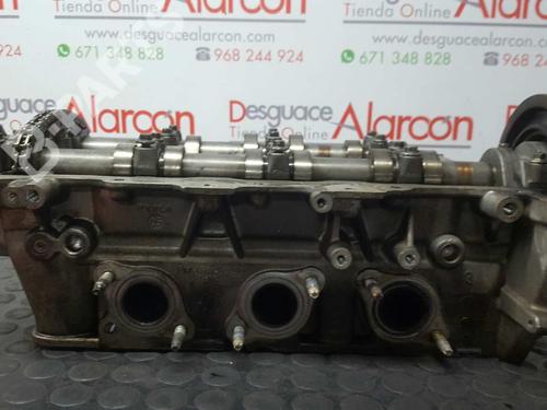 Used Cylinder head PEUGEOT 607 (9D, 9U) 2.7 HDi 24V (204 hp) 10977631
