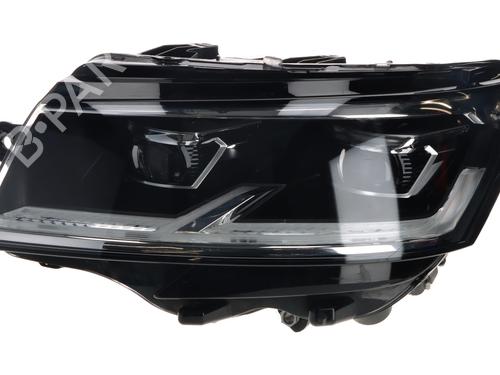 Used Left headlight VW TRANSPORTER T6 Van (SGA, SGH, SHA, SHH) 2.0 TDI (110 hp) 15611674