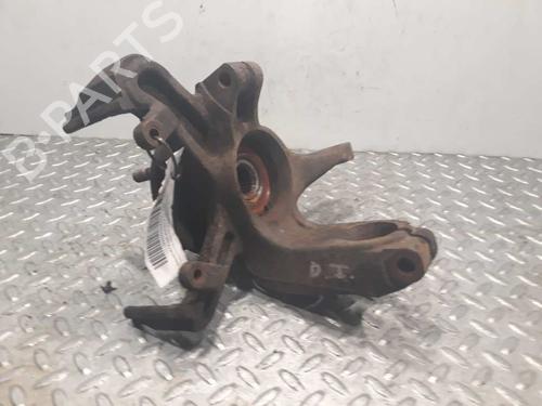 Used Left front steering knuckle FORD FOCUS I (DAW, DBW) 1.6 16V (100 hp) 3065462