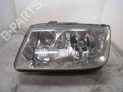 Used Left headlight VW BORA I (1J2) 1.4 16V (75 hp) 19719429