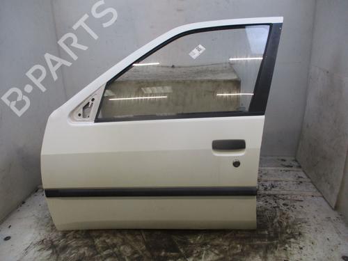 Used Left front door PEUGEOT 306 Hatchback (7A, 7C, N3, N5) [1993-2003]  26639146