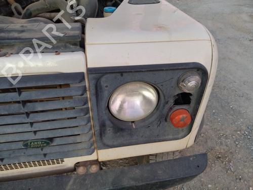 Used Left headlight LAND ROVER DEFENDER Station Wagon (L316) 2.5 Td5 4x4 (L316) (122 hp) 13549133