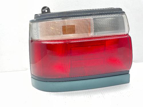 Used Left taillight TOYOTA COROLLA Compact (_E10_) 1.3 XLI (EE101_, EE101R) (75 hp) 31019820
