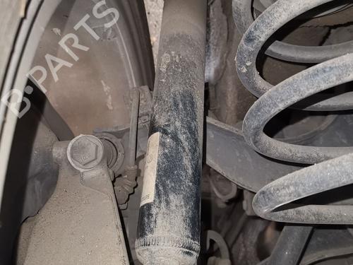 Used Left rear shock absorber VW PASSAT B7 (362) 2.0 TDI (140 hp) 33006512