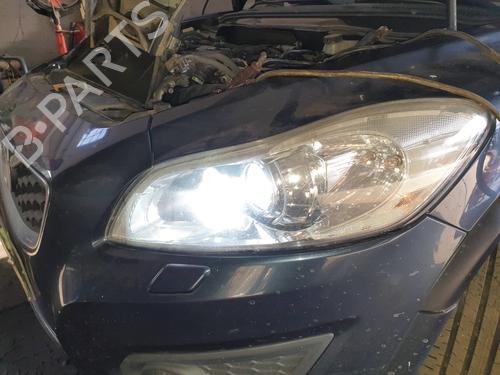 Used Left headlight VOLVO C30 (533) D2 (115 hp) 14907990